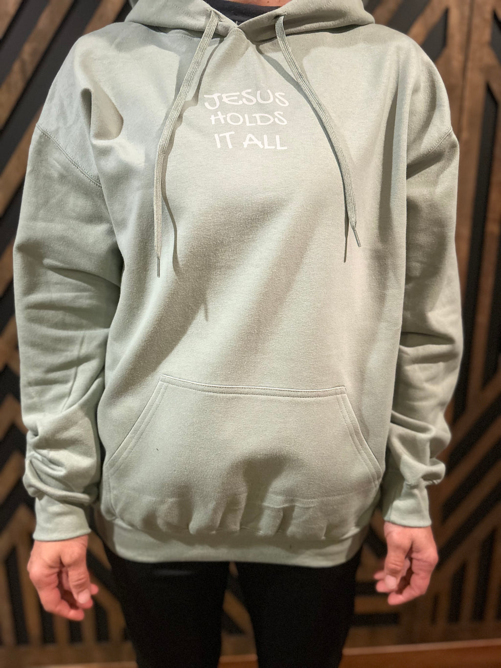 Jesus holds it all sweatshirt
