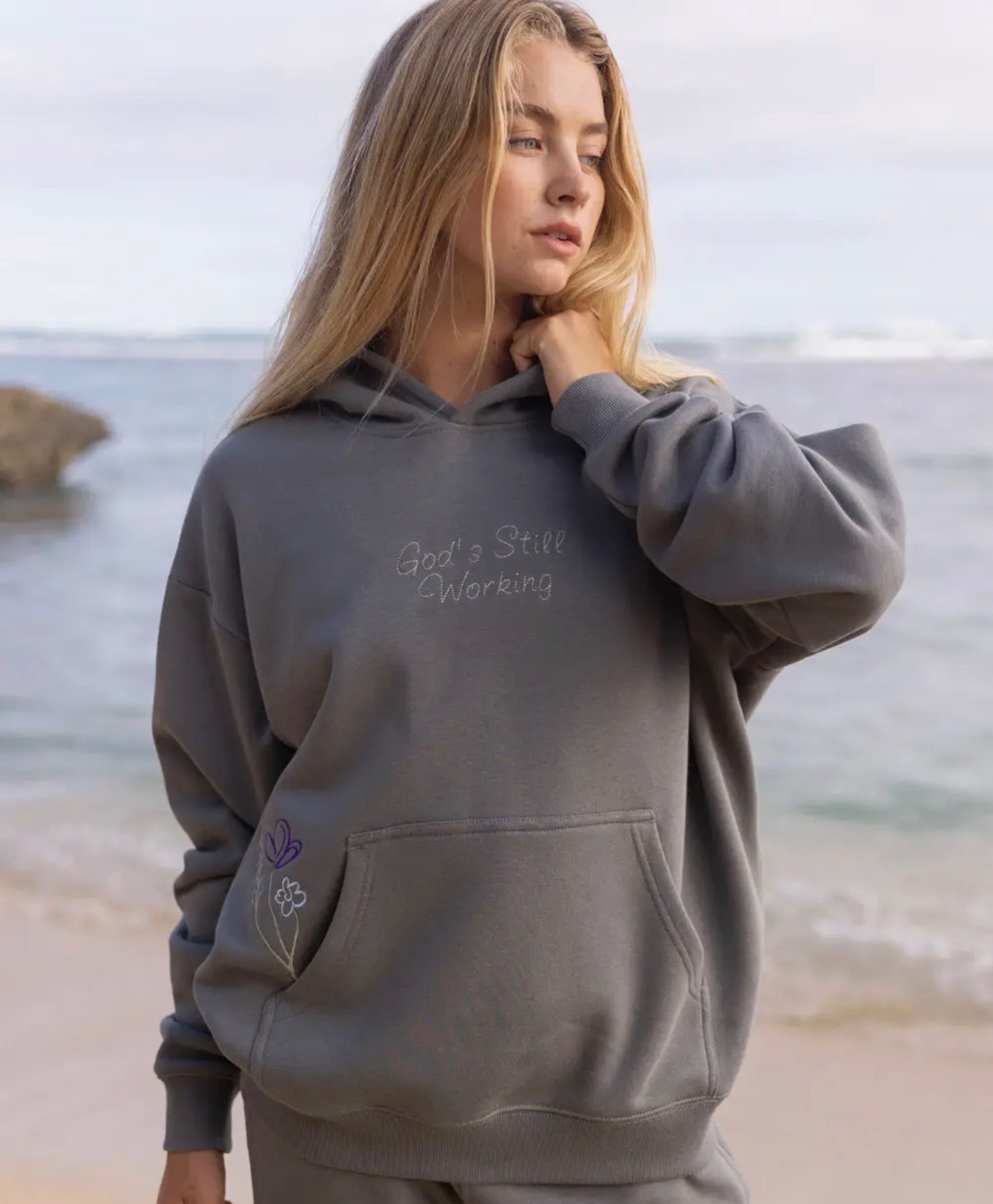 Gods still working inside hoodie